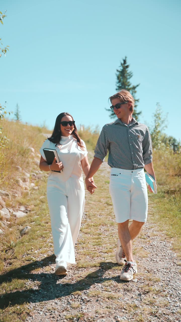 Couple walking a trail in a community spotlight reel